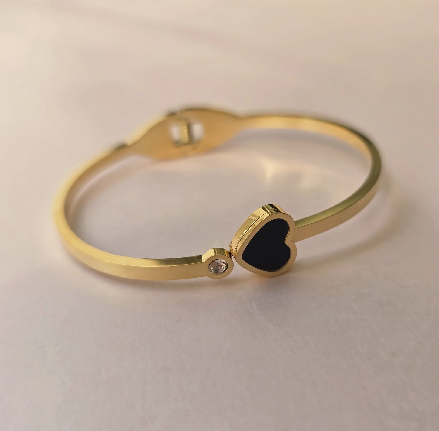Gold Bracelet With Black Heart